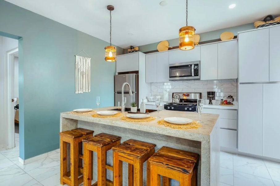 Kitchen island with wooden stools