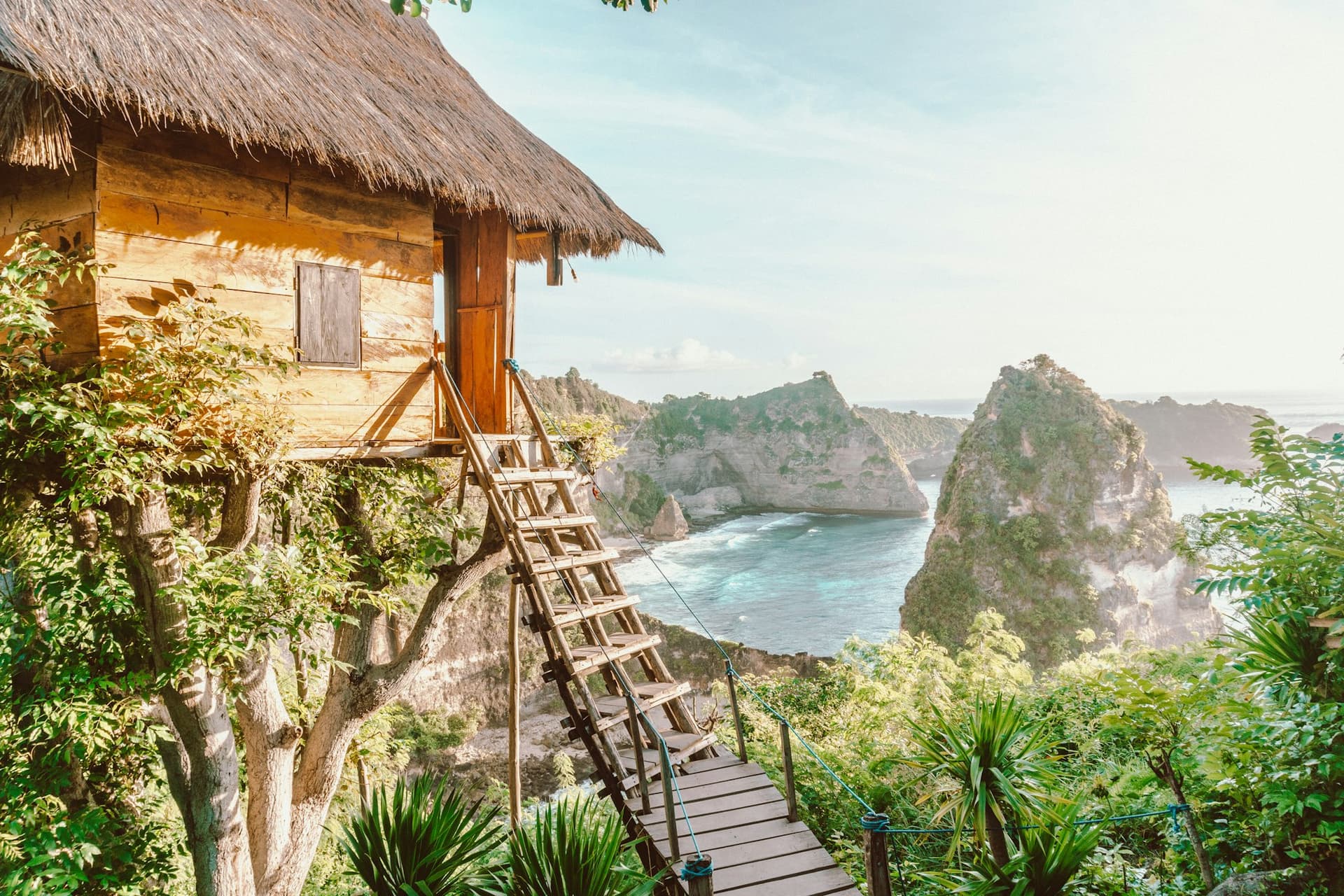 Thatched house beside the water in Bali